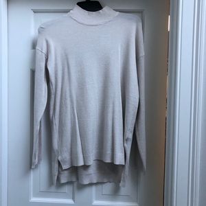 Cyrus off white turtle neck sweater with tags